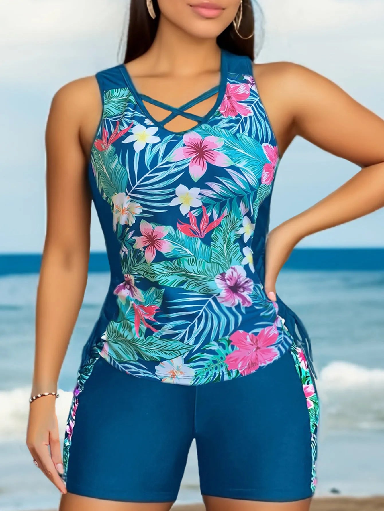 Plus size women's floral print high-waisted bikini for swimming in navy blue, black, green, and blue colours