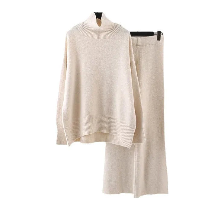Women's beige acrylic fibre sweater and wide-leg trousers two-piece set on a hanger.