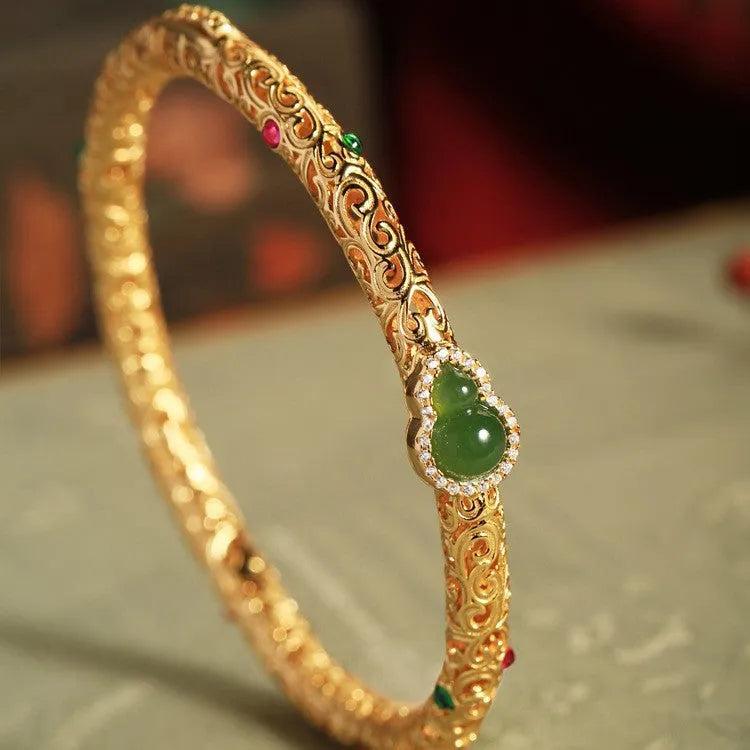 Gold-plated women's bracelet with xiangyun gourd design and retro opening style