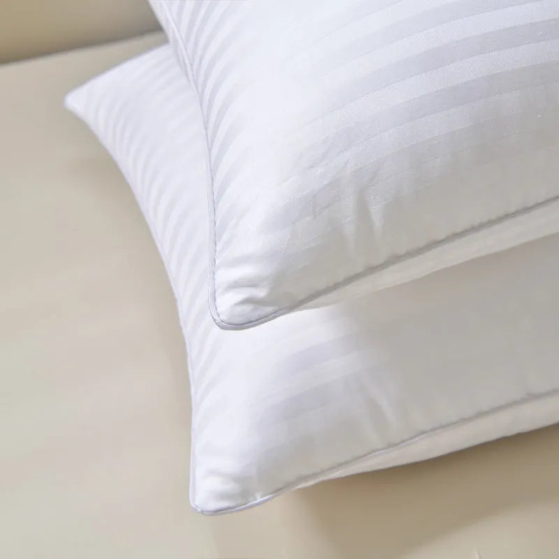White hotel cotton satin stripe pillow with feather cotton filling shown in three size options.