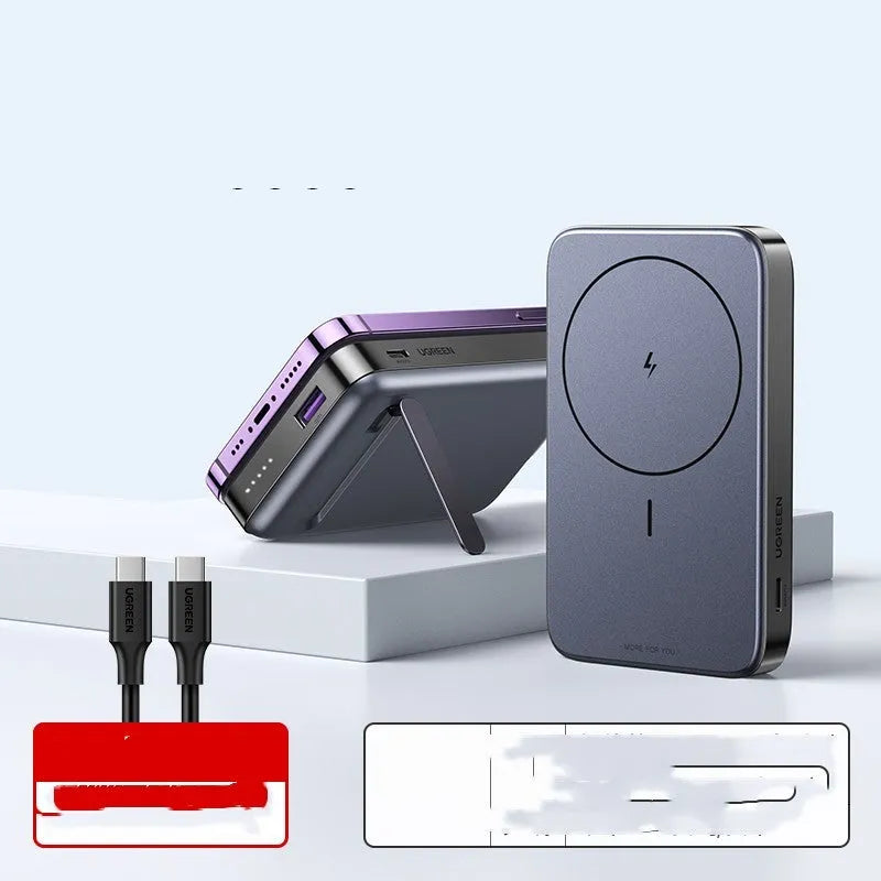 Small black portable magnetic bracket power bank with 10000mAh capacity on a table.