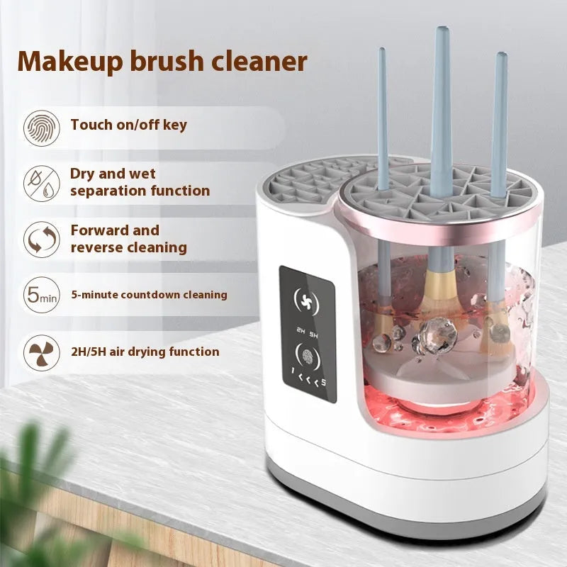 White rechargeable automatic makeup brush cleaner and dryer stand on a table