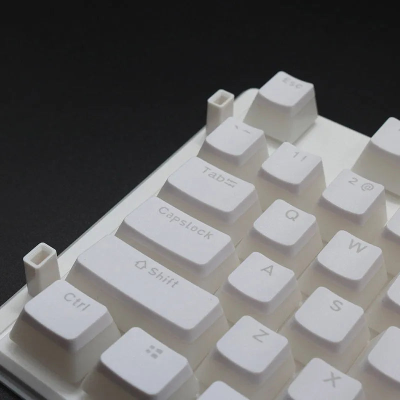 Set of 108 PBT pudding profile keycaps for mechanical keyboards in various colours on a white background.