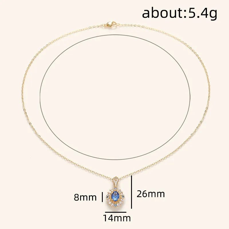 Golden copper necklace with a mixed gemstone inlaid pendant on a box chain.