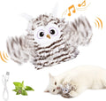 Grey automatic owl cat toy with flapping wings on a floor