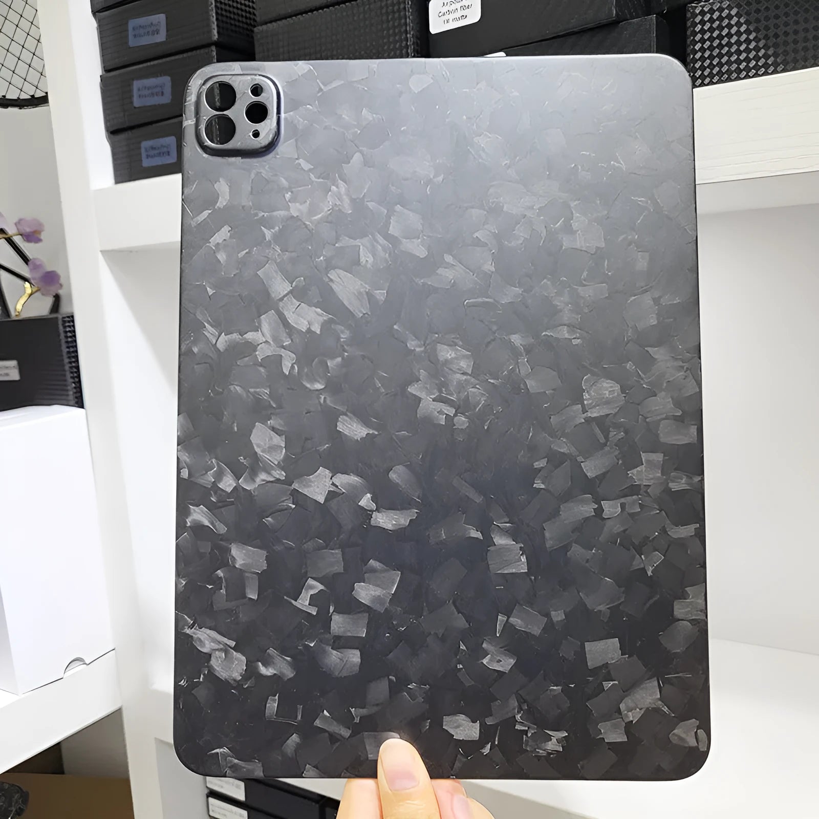 Genuine carbon fibre hard protective case for Apple iPad Pro 11 inch in matte and forged finishes.