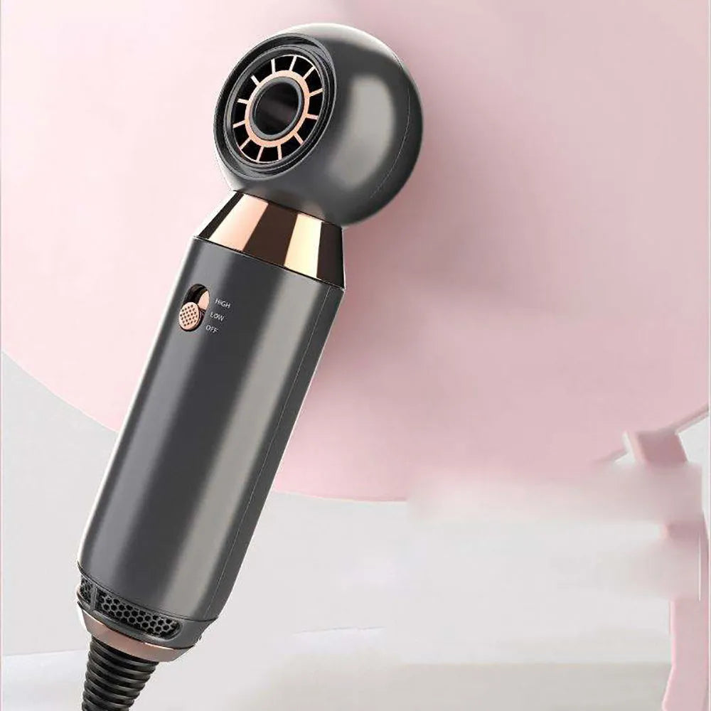 Compact white hair dryer with concentrator attachment measuring 20cm long