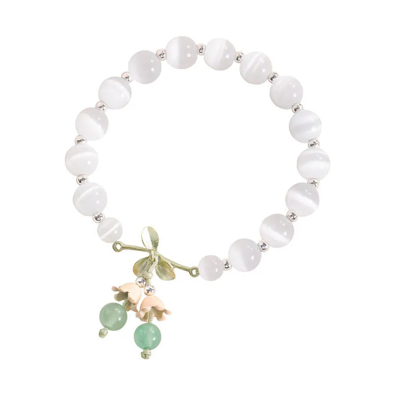 Women's cat's eye stone beaded bracelet with electroplated opal stones in diamond shape.
