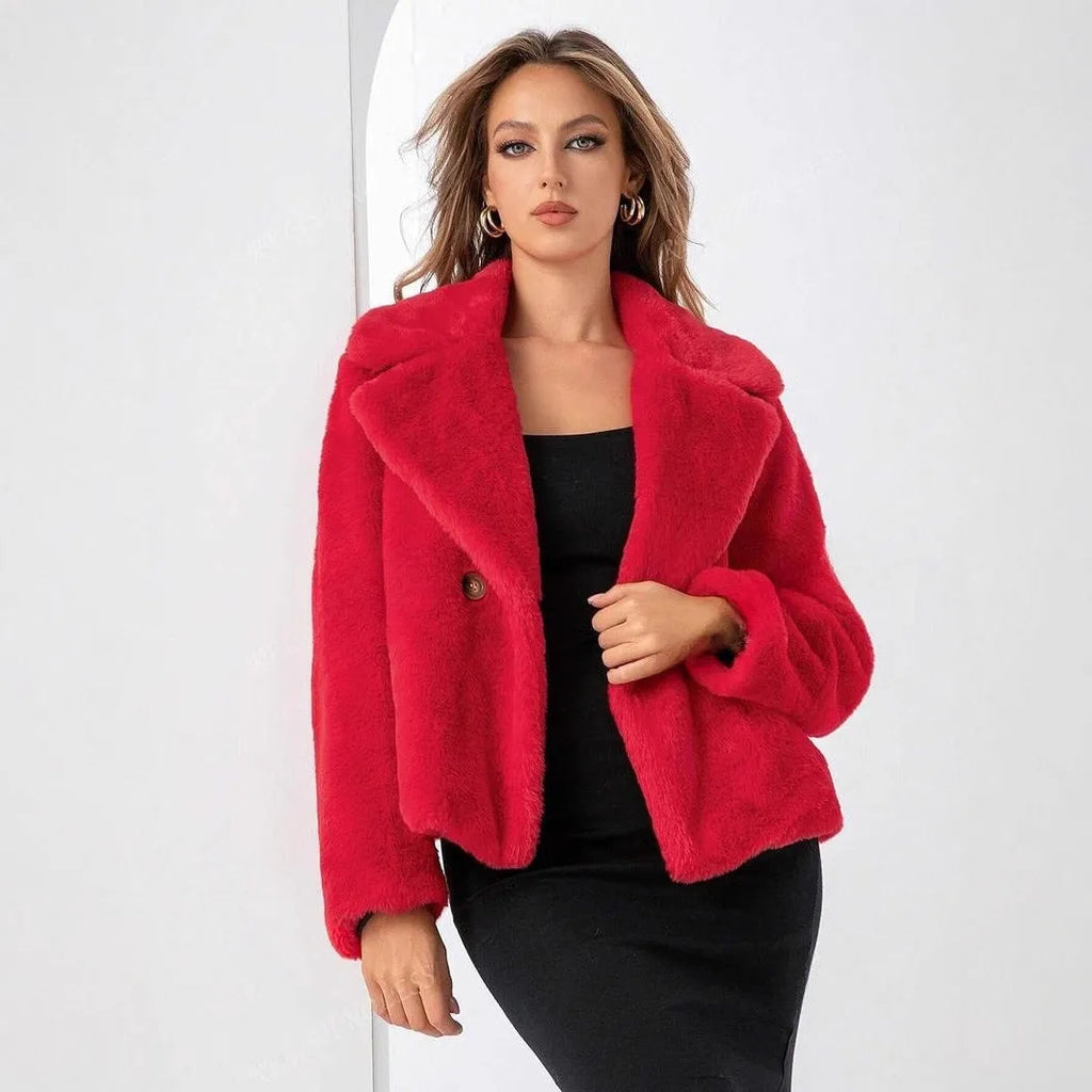 Short loose women's coat in rose red artificial faux fur with regular sleeves.